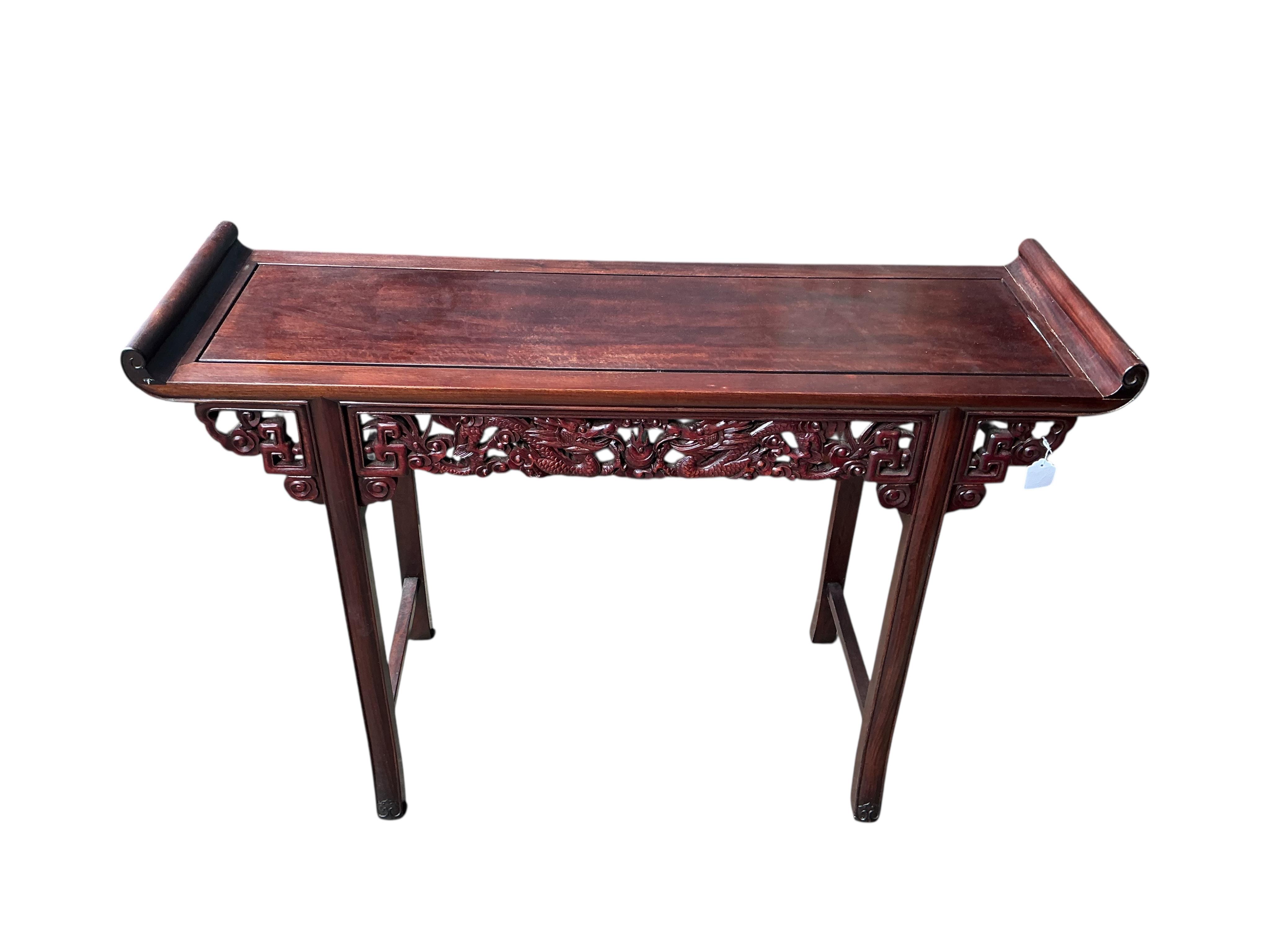 A Chinese altar table, width 122cm, depth 40cm, height 84cm